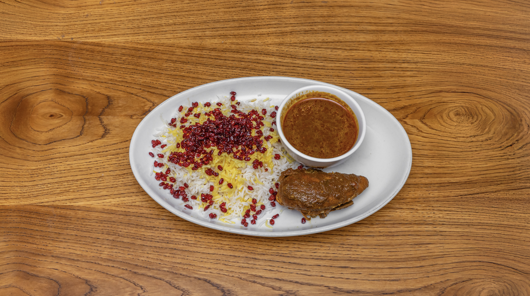 Zereshk polo with braised chicken